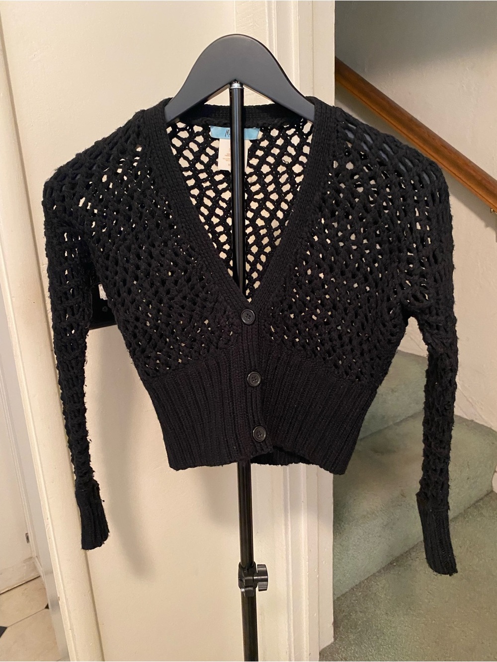 Guess women’s light weight button up sweater. Black size XS.